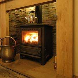 Re-Light Your Fire: 7 Stylish Fireplace Tiles