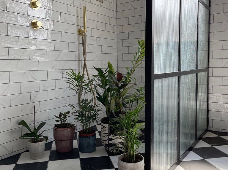 Lynne and Josh Created a Luxurious Look in their Bathroom with our Marble Effect Tiles