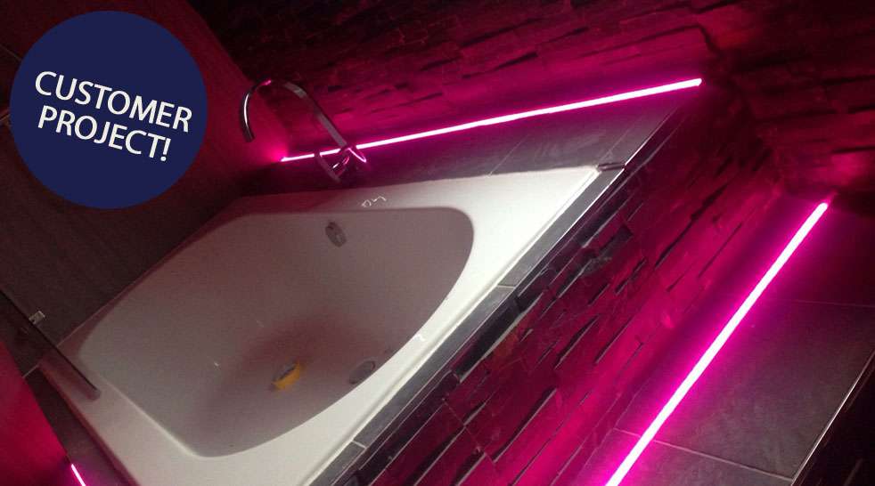 Splitface bathroom with accent lighting
