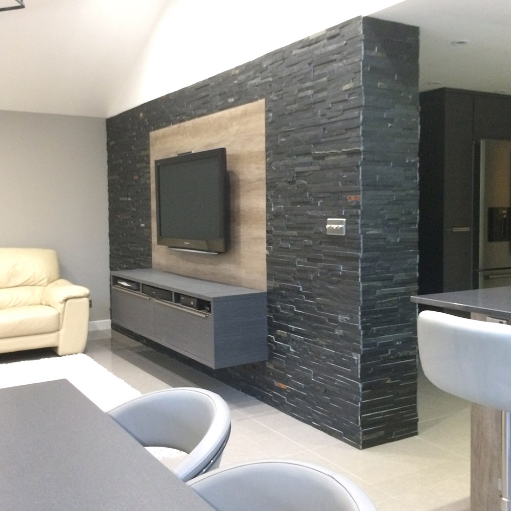 Split face tiles living room feature wall