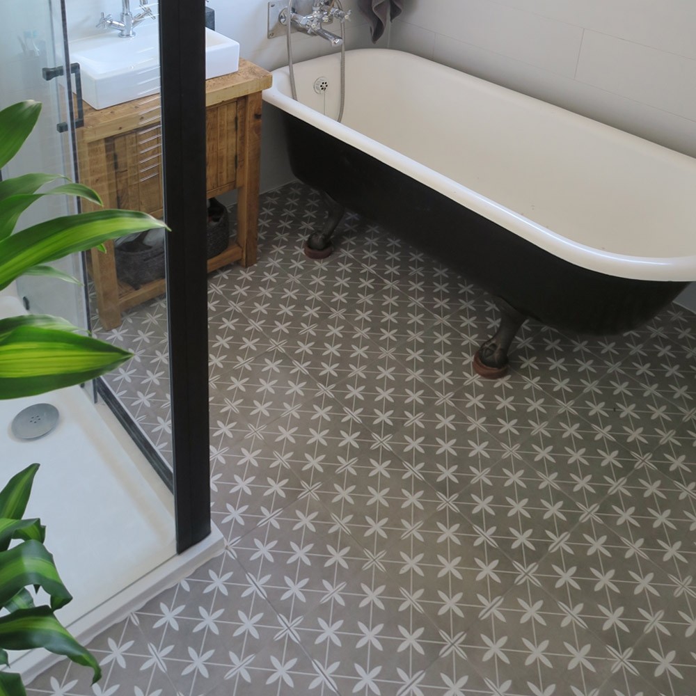 Grey patterned bathroom floor tiles