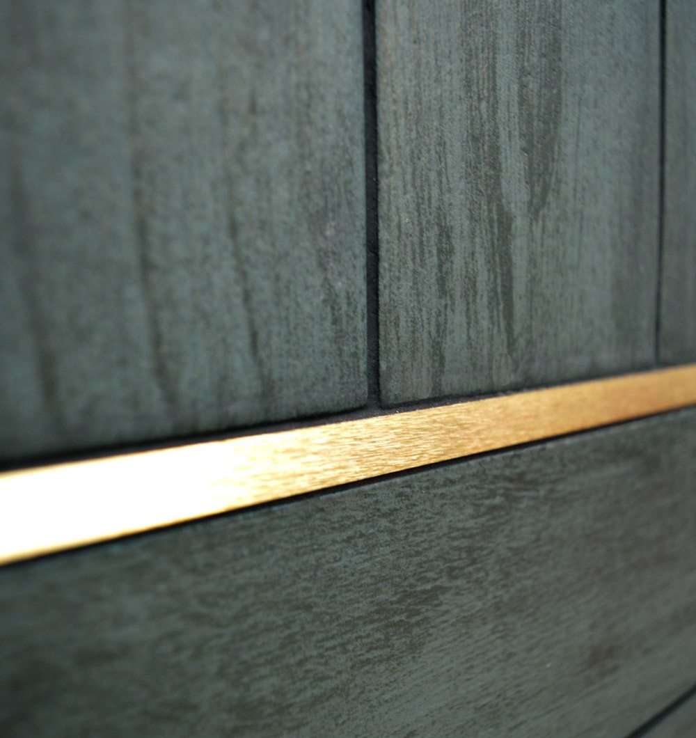 wood effect tiles with brushed brass tile trim