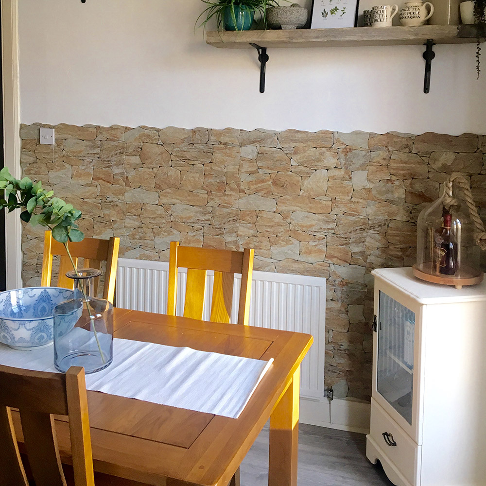 Stone effect wall tiles in dining room