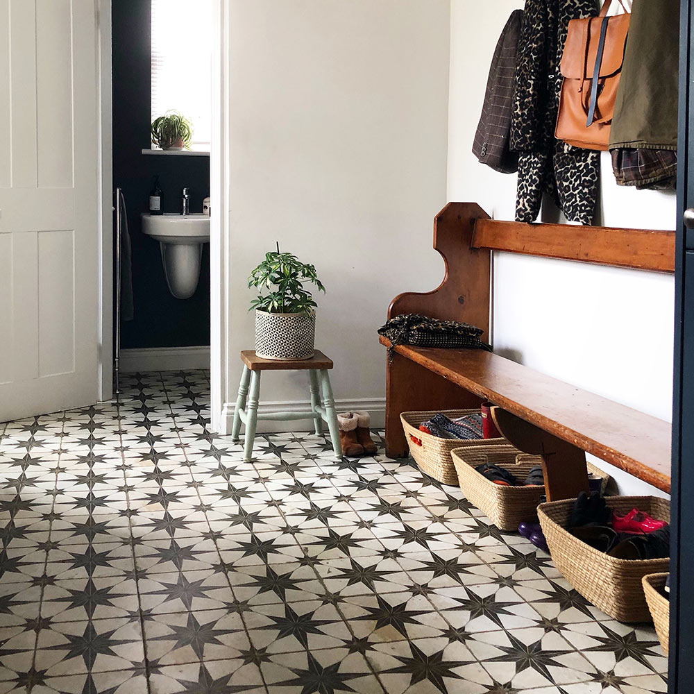 Patterned star scintilla tiles in a boot room
