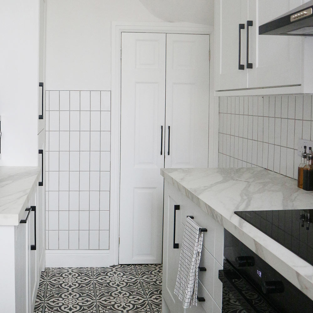 Vertical white metro kitchen wall tiles