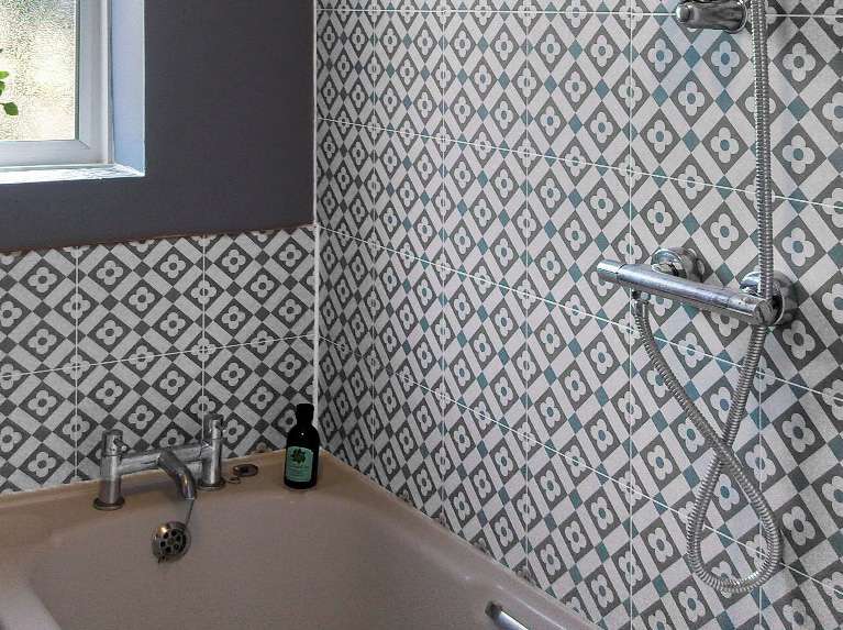 Heather Created A Patterned Statement Bathroom with Daisy Bloom Tiles