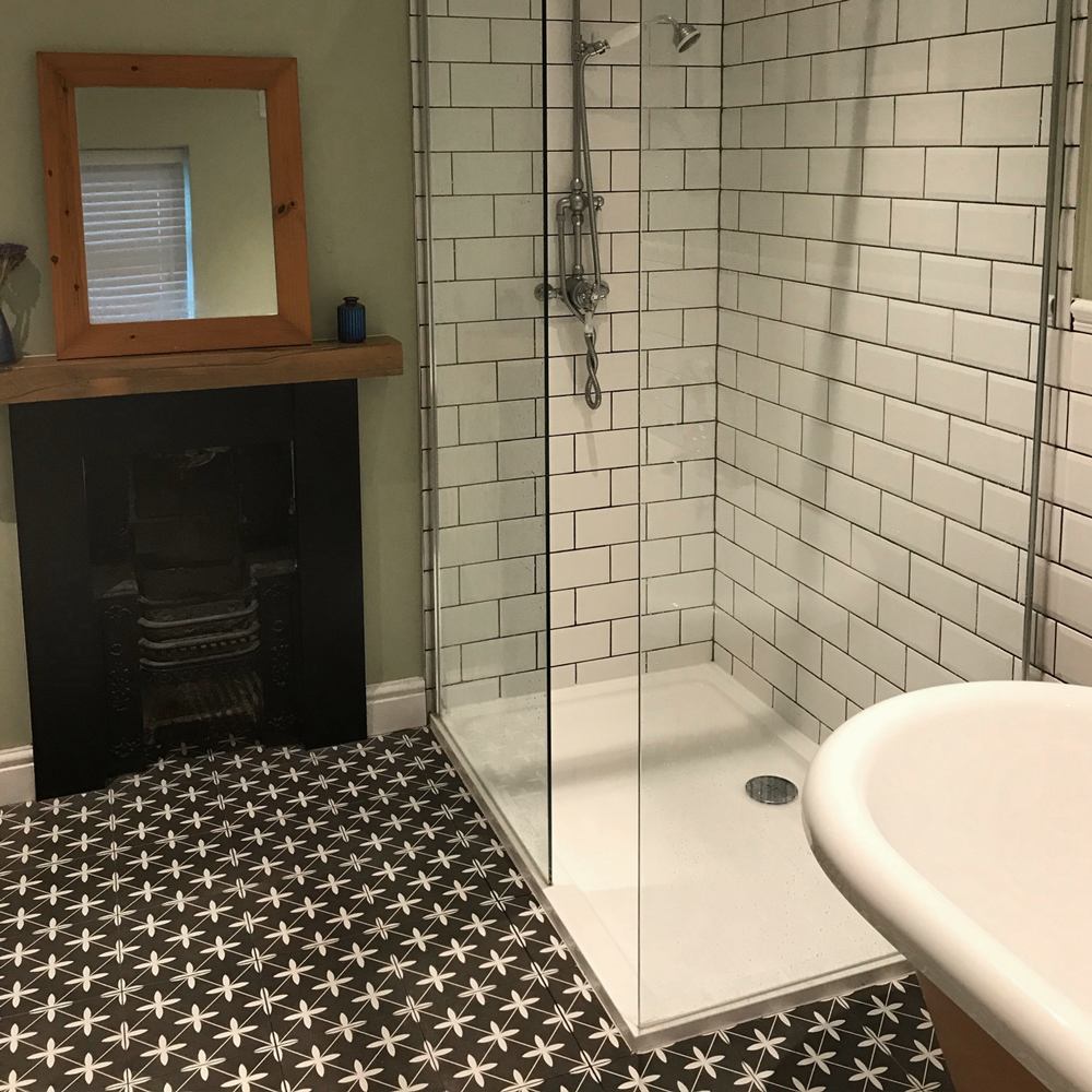 Black oakham patterned bathroom floor tiles