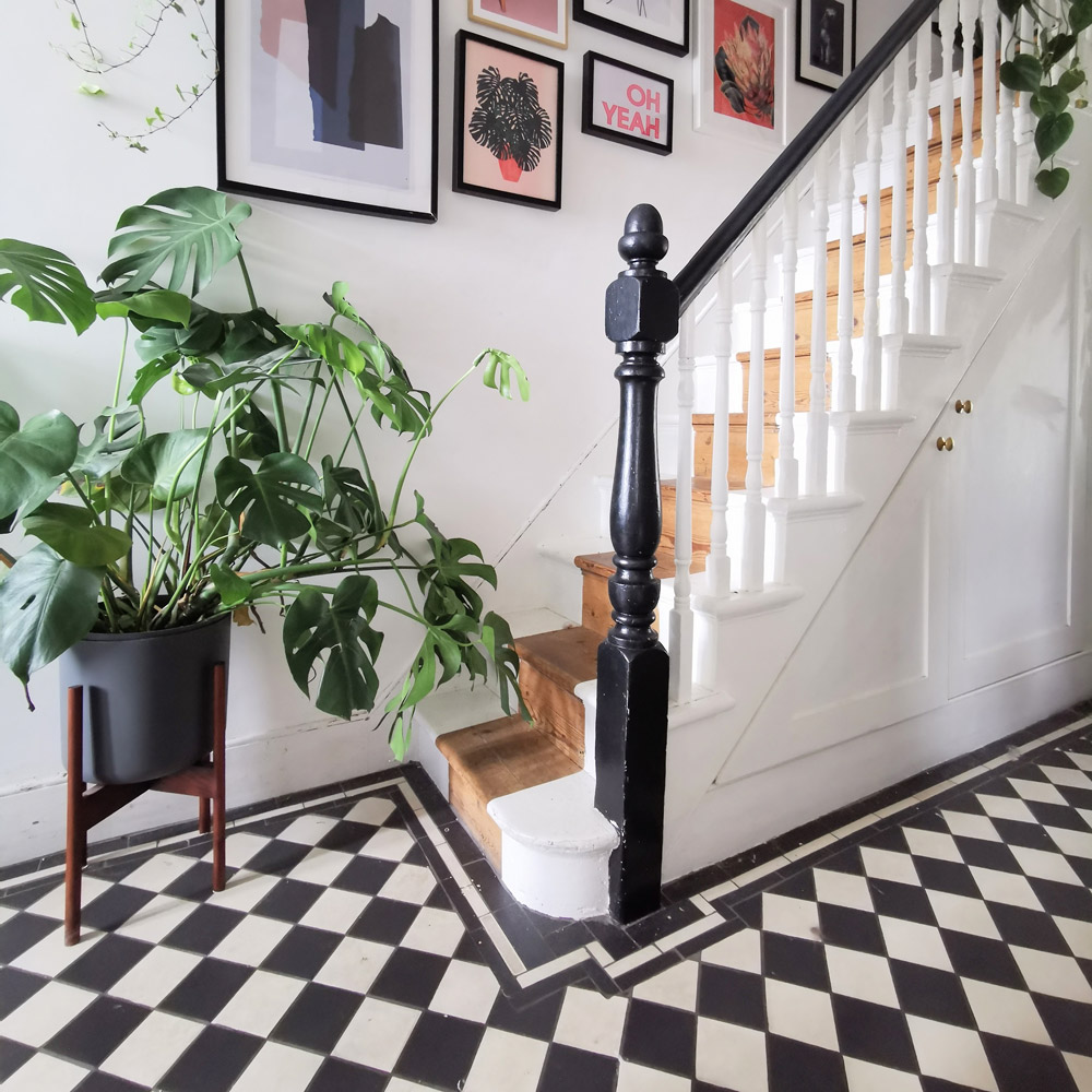 black and white chequered hallway tiles
