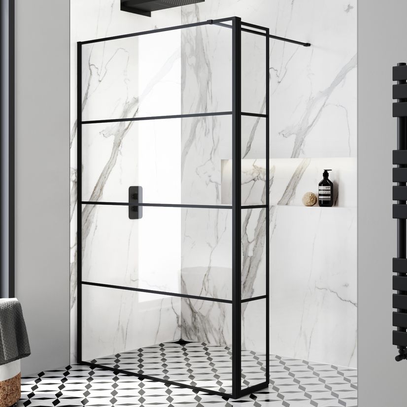White marble wet room with black boarded glass screen 