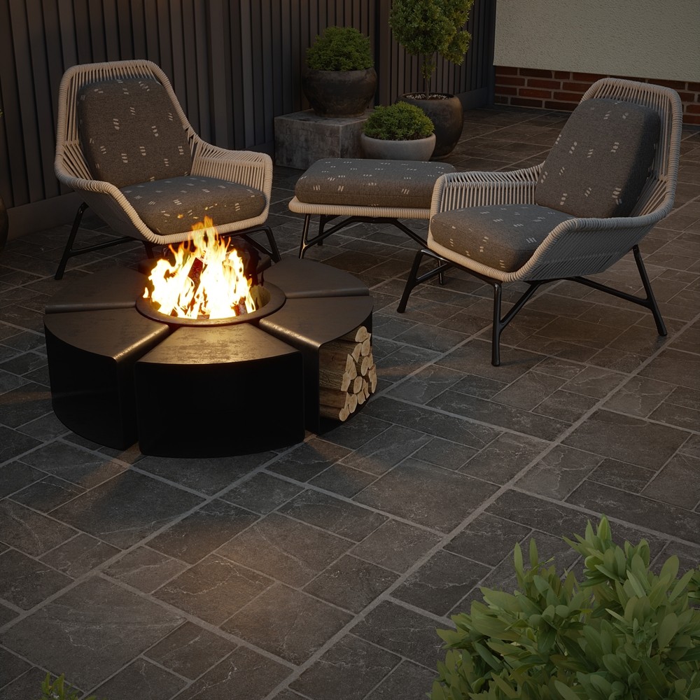 witton tiles with an outdoor log fire at night