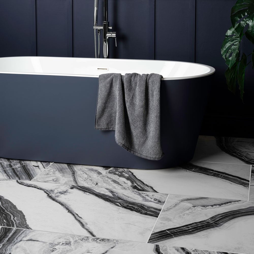 blue bath and walls with black and white marble