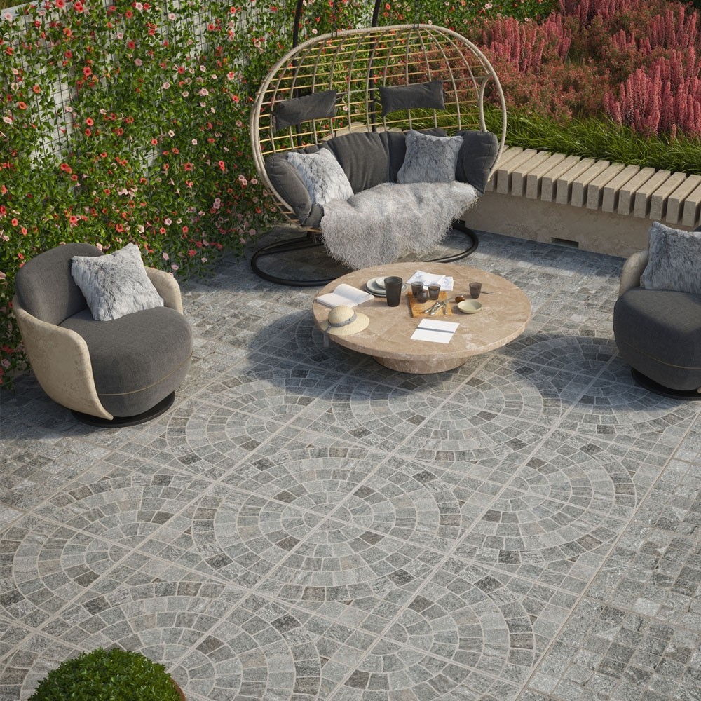 valeria grigio arco porcelain slabs in circular patterns on a patio