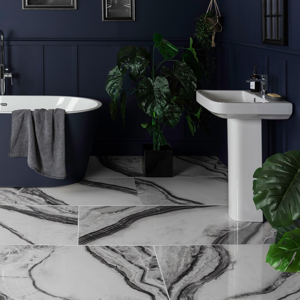 black and white panda marble deluxe tiles in a navy coloured bathroom