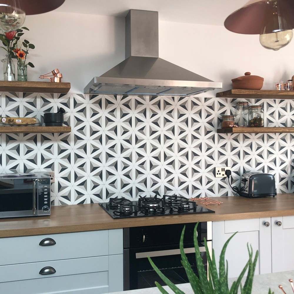 geometric hexagon tiles as a splashback in a kitchen 