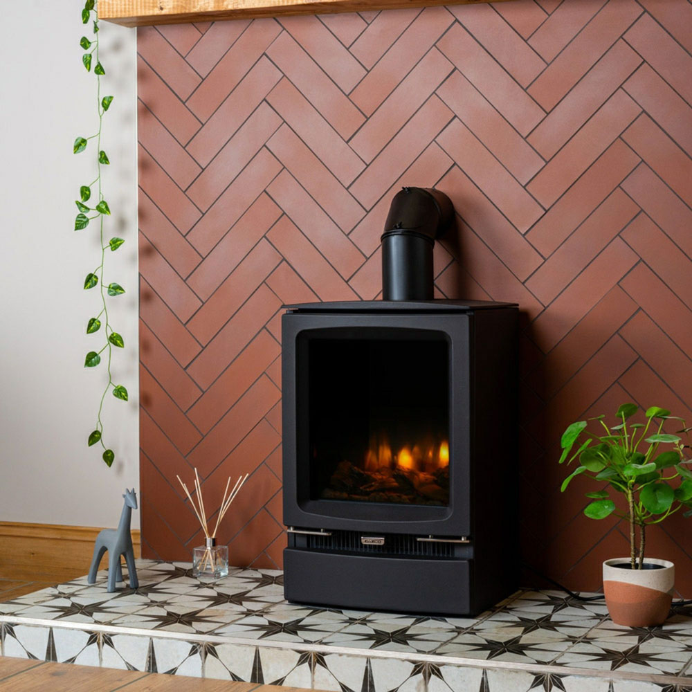 Terracotta wall tiles on fireplace.