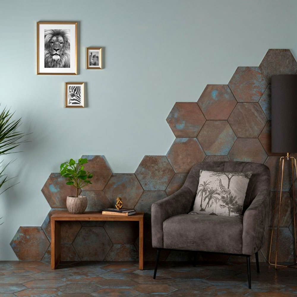 rustic oxidised hexagonal wall and floor tiles across seating area. 