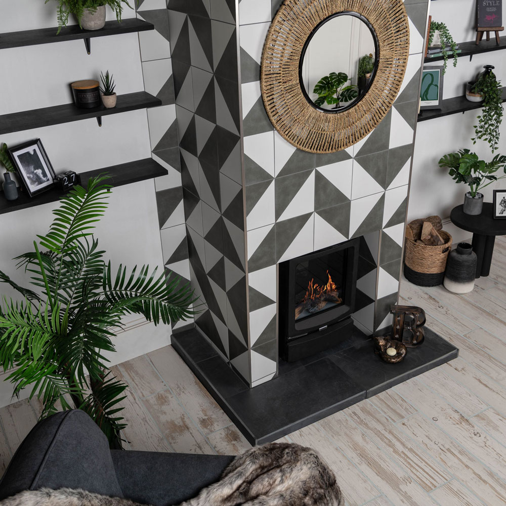 Black and white geometric patterned fireplace area in living room.