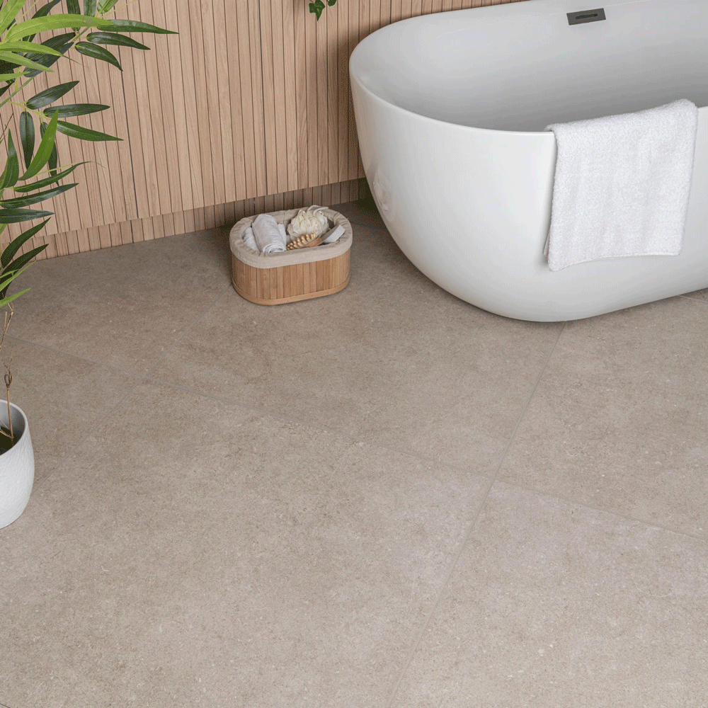 Natural stone effect tiles across floor for a home spa bathroom, combined with wooden slat tiles for an enhanced natural look.