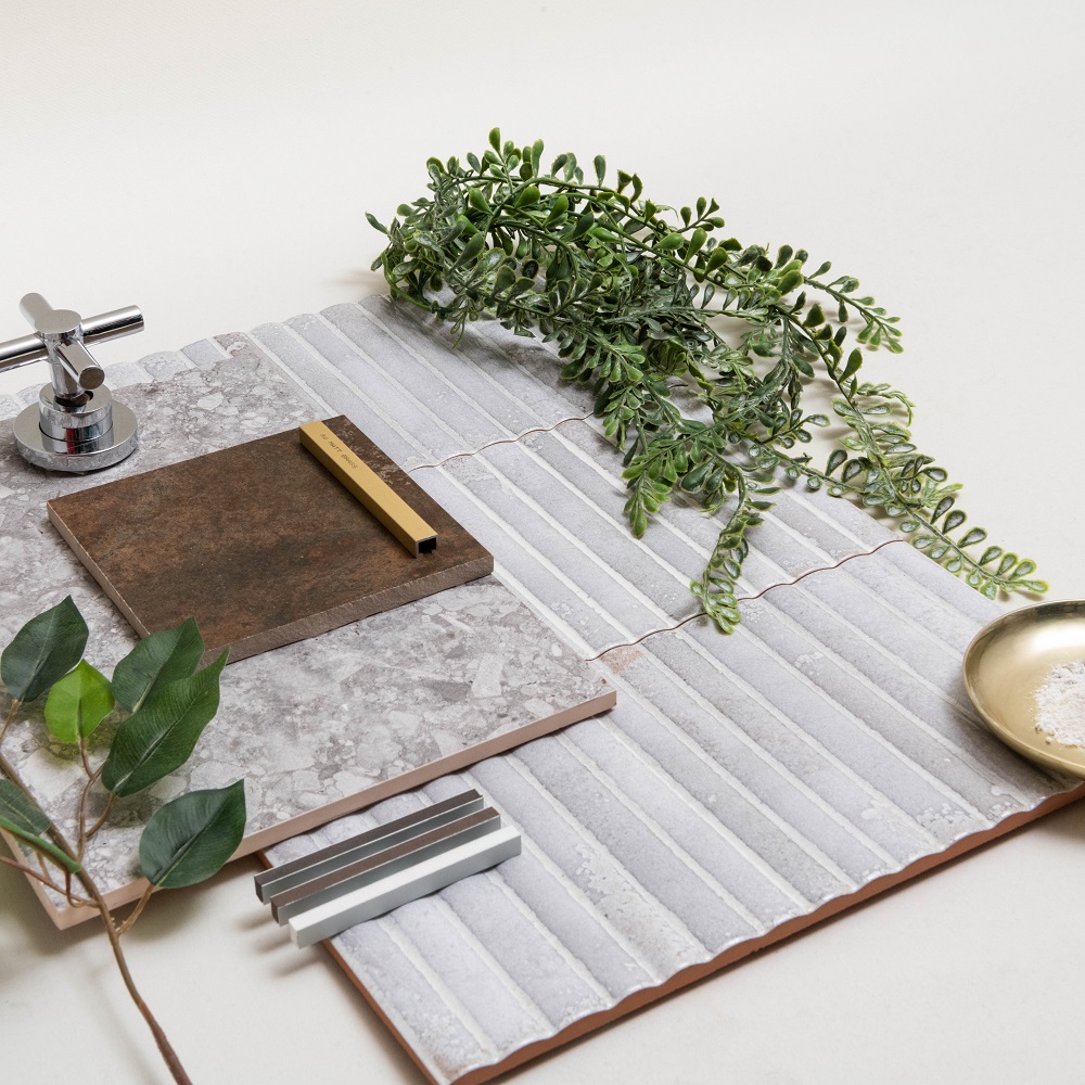 Tile styling inspiration within moodboard layout showcasing tiles and grout, with plants. 