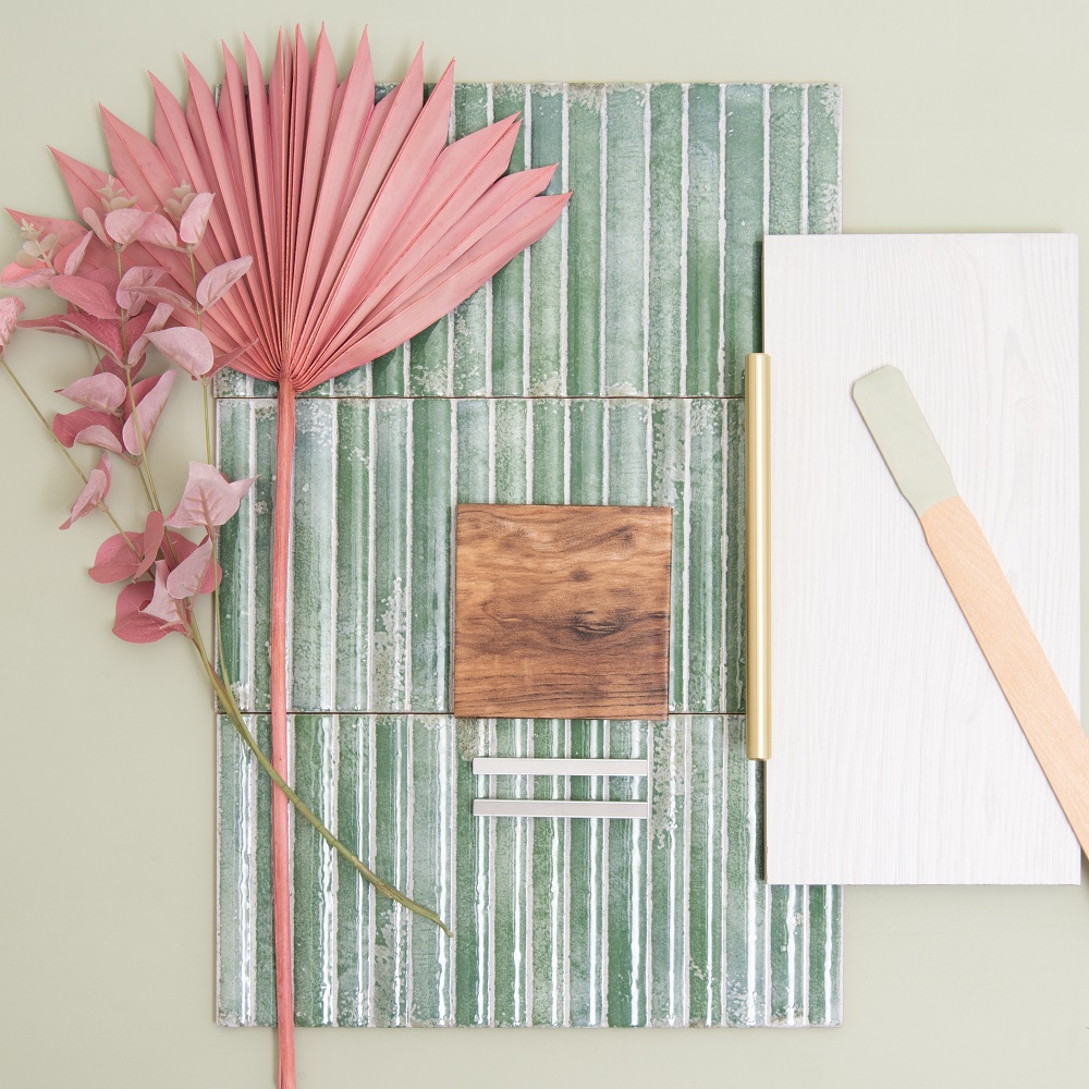 Green tile styling inspiration in moodboard form with warm wood textures and pink foliage to compliment. 