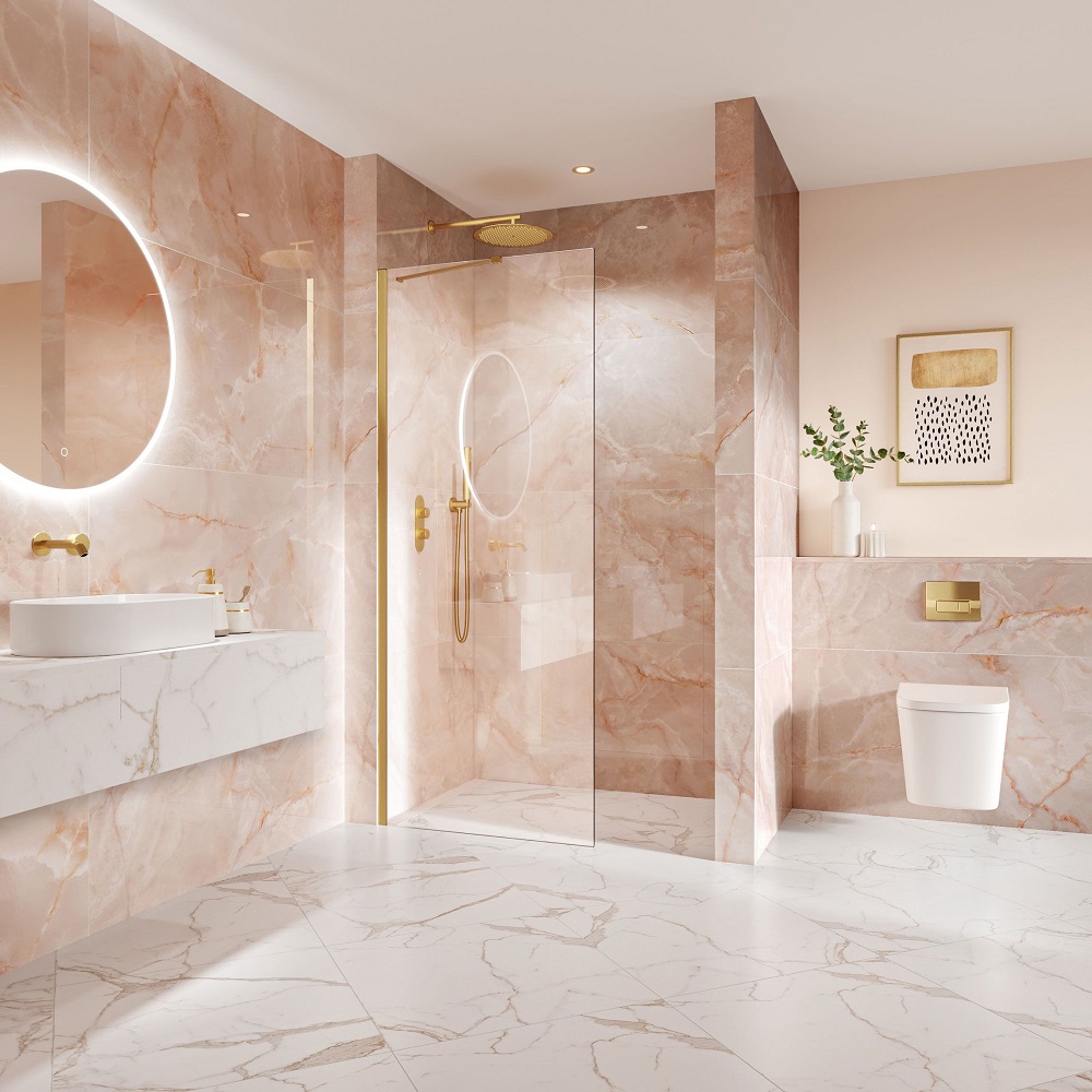 Pastel pink onyx effect large format tiles across wall of bathroom space.