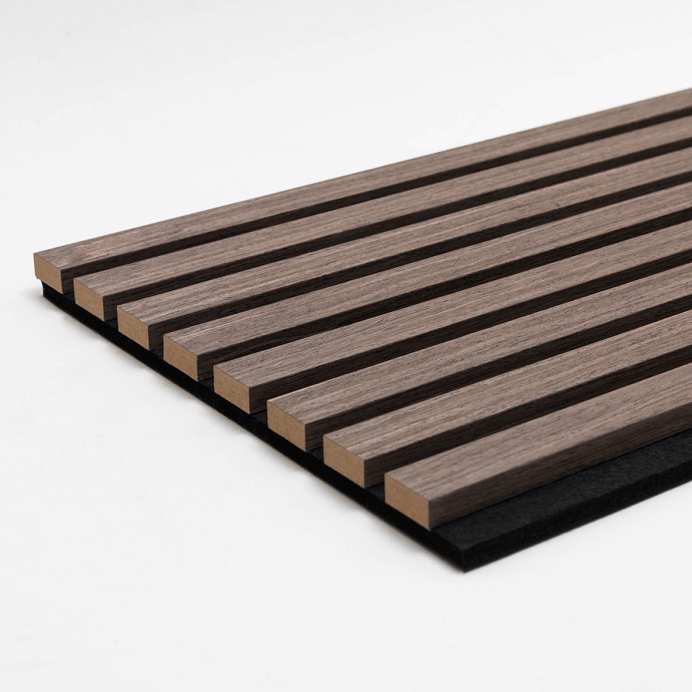 Close up of a walnut wood slat panel with alternating light and dark brown shades, showcasing the natural wood grain texture, perfect for modern interior design or architectural backgrounds, highlighting some of the benefits of using wood slat wall panels. 